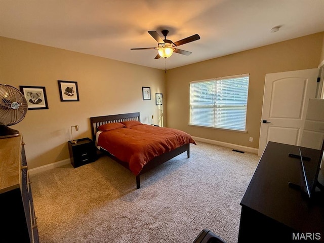 5005 Double Tree Dr, Imperial, MO 63052 - carpeted bedroom with baseboards and ceiling fan