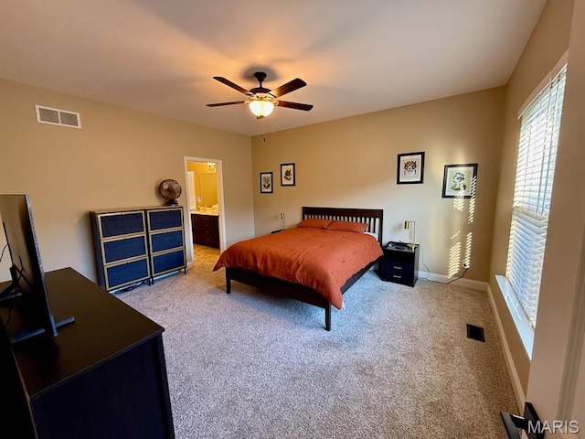 5005 Double Tree Dr, Imperial, MO 63052 - carpeted bedroom featuring baseboards, ensuite bath, and ceiling fan
