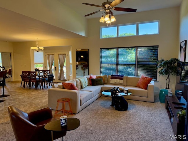 5005 Double Tree Dr, Imperial, MO 63052 - carpeted living area with a chandelier, healthy amount of natural light, ceiling fan, and a high ceiling