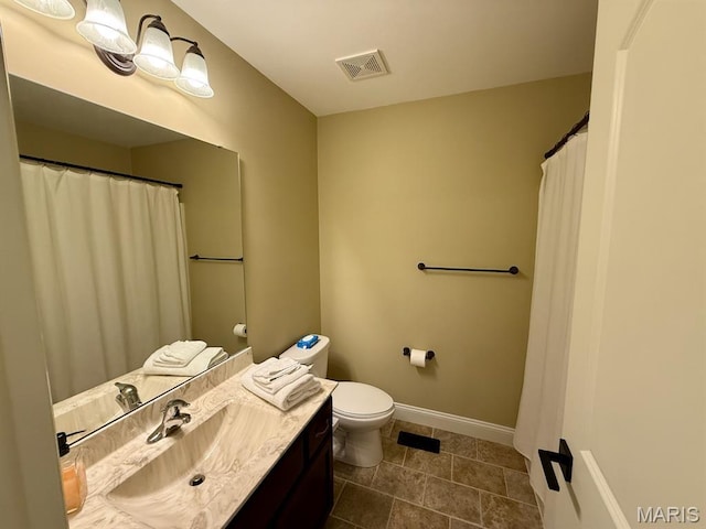 5005 Double Tree Dr, Imperial, MO 63052 - bathroom with vanity, toilet, and baseboards