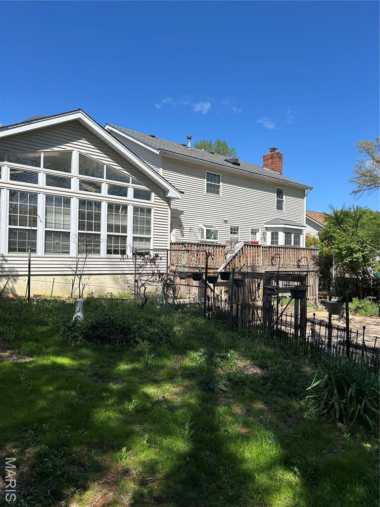 918 N Ballas Rd, Saint Louis, MO 63131 - back of house featuring a chimney