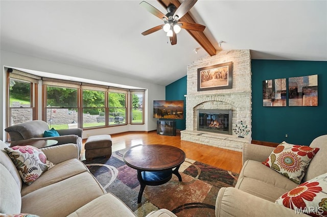 55 Cambrian Way, Saint Charles, MO 63301 - living room featuring wood finished floors, a ceiling fan, and a fireplace