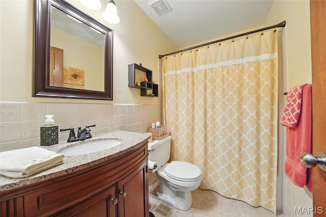 55 Cambrian Way, Saint Charles, MO 63301 - full bath featuring vanity, tile patterned flooring, tile walls, tasteful backsplash, and a shower with curtain