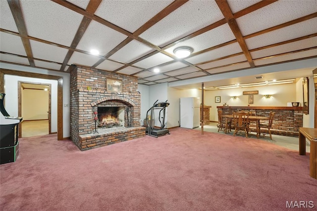 55 Cambrian Way, Saint Charles, MO 63301 - carpeted living room with bar area, a brick fireplace, and coffered ceiling