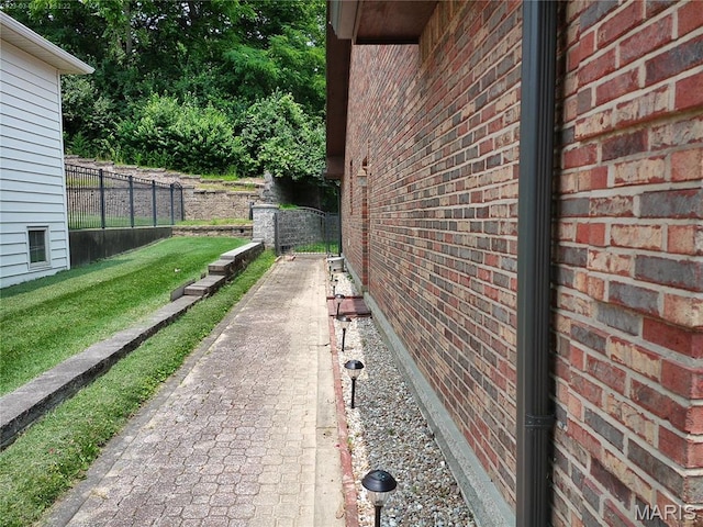 55 Cambrian Way, Saint Charles, MO 63301 - view of side of home with brick siding