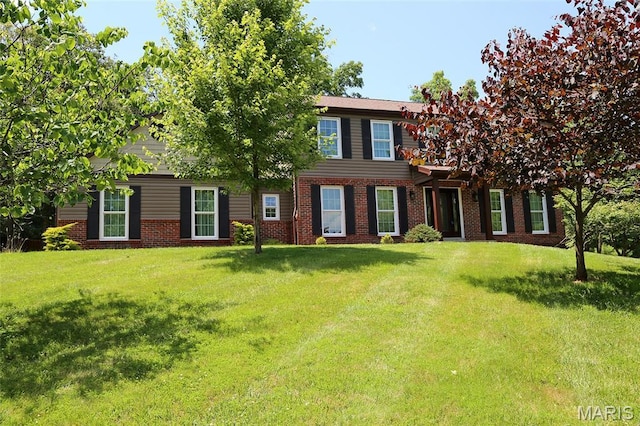 2003 Centennial Ct, Wildwood, MO 63011 - view of front facade featuring brick siding and a front yard