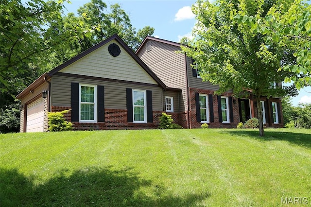 2003 Centennial Ct, Wildwood, MO 63011 - view of front of home featuring brick siding, an attached garage, and a front yard
