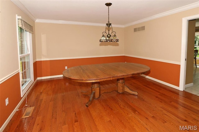 2003 Centennial Ct, Wildwood, MO 63011 - dining room featuring wood finished floors and ornamental molding