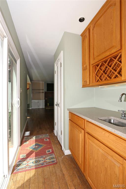 2003 Centennial Ct, Wildwood, MO 63011 - hallway featuring dark wood-type flooring