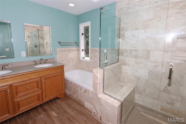 2003 Centennial Ct, Wildwood, MO 63011 - bathroom featuring a tile shower, a garden tub, and double vanity