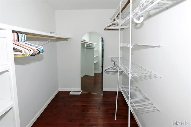 2003 Centennial Ct, Wildwood, MO 63011 - walk in closet with wood finished floors and arched walkways
