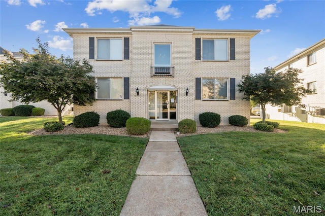 12556 Chardin Pl Unit 4, Saint Louis, MO 63128 - view of front of house with brick siding and a front yard