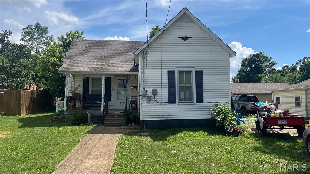 405 W Marvin, Fredericktown, MO 63645 - view of front of home with covered porch and a shingled roof