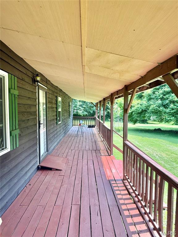 720 S Main St, Arcadia, MO 63621 - wooden terrace featuring a lawn