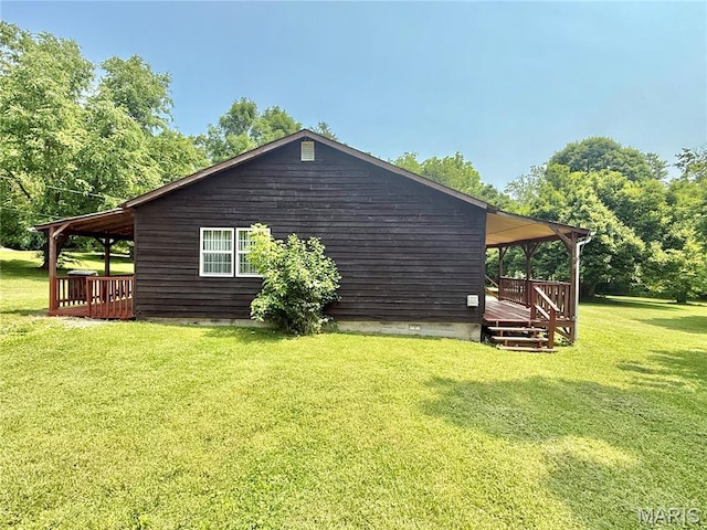 720 S Main St, Arcadia, MO 63621 - view of home's exterior with a wooden deck and a yard