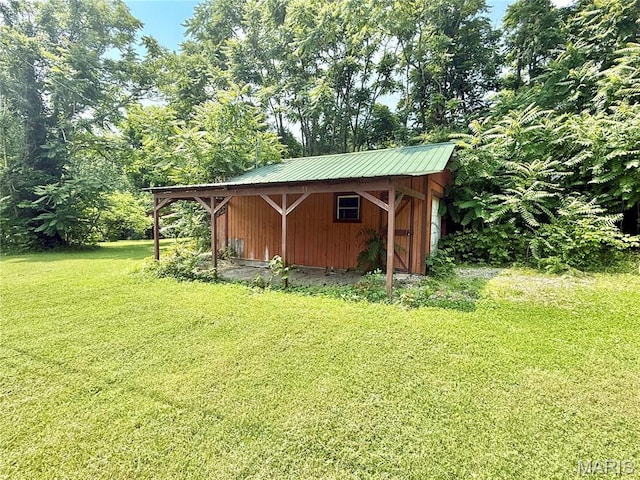 720 S Main St, Arcadia, MO 63621 - view of pole building with a yard