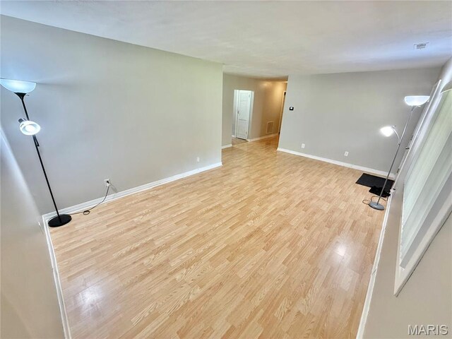 720 S Main St, Arcadia, MO 63621 - unfurnished room with light wood-style flooring and baseboards