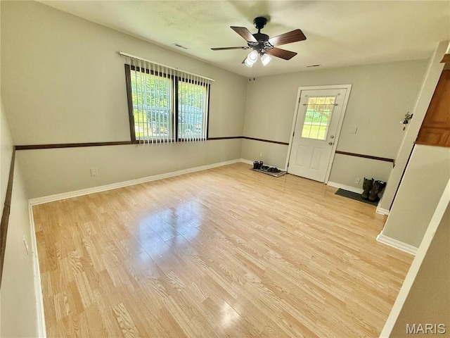 720 S Main St, Arcadia, MO 63621 - unfurnished room featuring light wood-style flooring, a ceiling fan, and baseboards