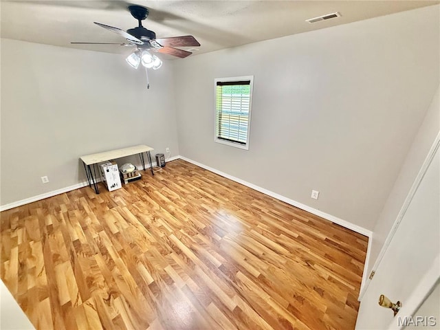 720 S Main St, Arcadia, MO 63621 - spare room with light wood-style flooring, a ceiling fan, and baseboards