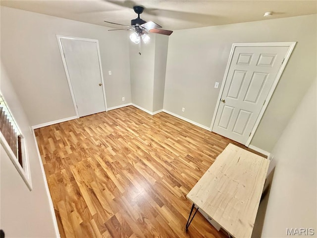 720 S Main St, Arcadia, MO 63621 - spare room with a ceiling fan, light wood-style floors, baseboards, and a smoke detector