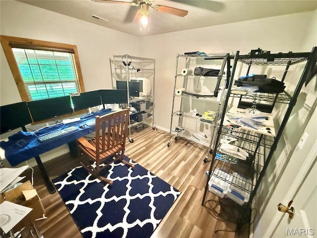 720 S Main St, Arcadia, MO 63621 - office area with wood finished floors, ceiling fan, and baseboards
