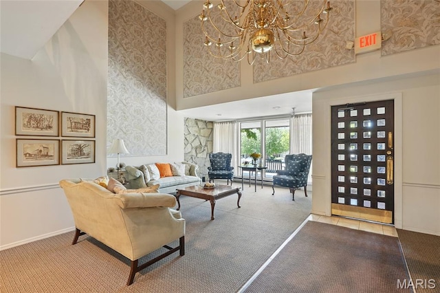 564 Sarah Ln Unit 103, Creve Coeur, MO 63141 - living area with carpet, a chandelier, a towering ceiling, baseboards, and wallpapered walls