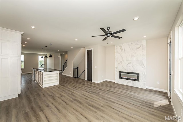 8923 Gateway Hts Unit 94-805, Richmond Heights, MO 63144 - unfurnished living room with recessed lighting, dark wood-style flooring, a sink, baseboards, and a ceiling fan