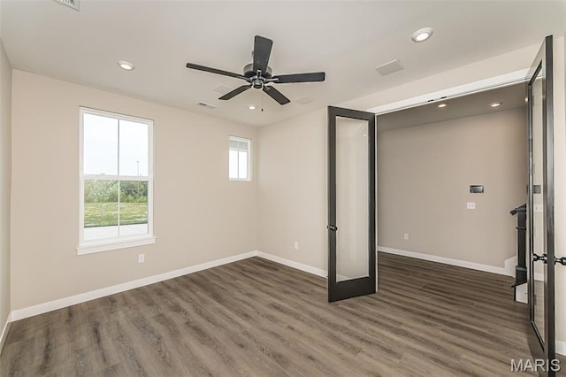 8923 Gateway Hts Unit 94-805, Richmond Heights, MO 63144 - unfurnished bedroom with baseboards, dark wood finished floors, recessed lighting, and a ceiling fan