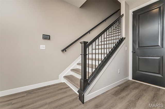 8923 Gateway Hts Unit 94-805, Richmond Heights, MO 63144 - stairs with wood finished floors and baseboards