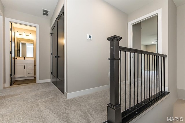 8923 Gateway Hts Unit 94-805, Richmond Heights, MO 63144 - hall featuring carpet floors and baseboards