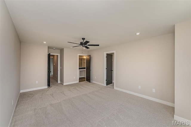 8923 Gateway Hts Unit 94-805, Richmond Heights, MO 63144 - unfurnished bedroom with recessed lighting, light colored carpet, baseboards, a walk in closet, and a ceiling fan