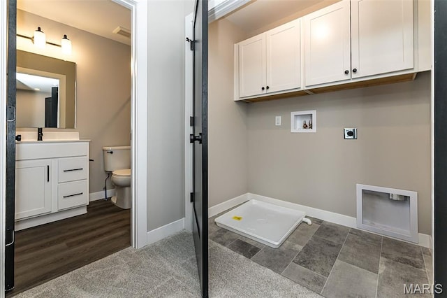 8923 Gateway Hts Unit 94-805, Richmond Heights, MO 63144 - washroom with cabinet space, hookup for an electric dryer, hookup for a washing machine, and baseboards