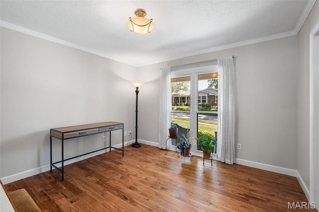 116 Lea Meadows Dr, Ballwin, MO 63011 - unfurnished room with wood finished floors, ornamental molding, baseboards, and a textured ceiling