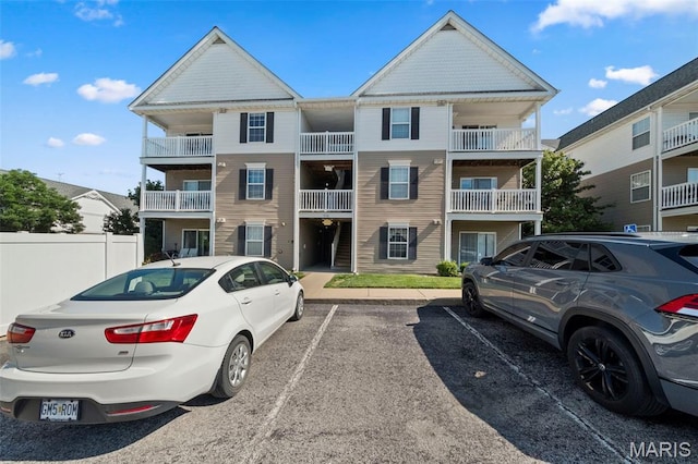 9740 Bexley Station Dr Unit 7J, Concord Township, MO 63123 - view of property featuring uncovered parking
