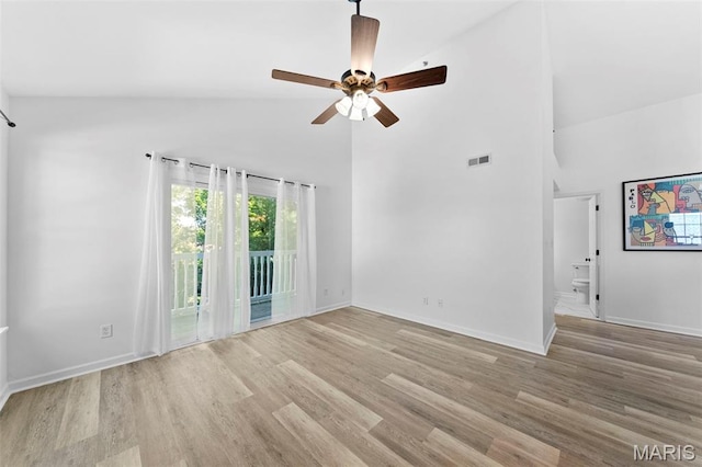 9740 Bexley Station Dr Unit 7J, Concord Township, MO 63123 - empty room featuring high vaulted ceiling, a ceiling fan, wood finished floors, and baseboards