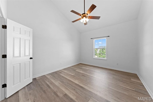 9740 Bexley Station Dr Unit 7J, Concord Township, MO 63123 - spare room featuring high vaulted ceiling, a ceiling fan, wood finished floors, and baseboards