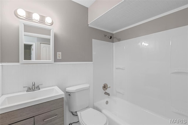 220 Versailles Dr, Florissant, MO 63031 - full bathroom featuring a wainscoted wall, vanity, and washtub / shower combination