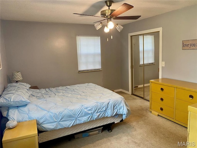 702 E Silver, Naylor, MO 63953 - bedroom with a closet, light colored carpet, a ceiling fan, and baseboards