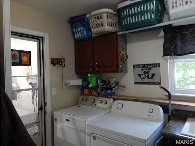 6230 Cuivre Ford Rd, Troy, MO 63379 - laundry area with washer and clothes dryer and cabinet space