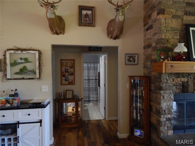 6230 Cuivre Ford Rd, Troy, MO 63379 - hall featuring dark wood finished floors and baseboards