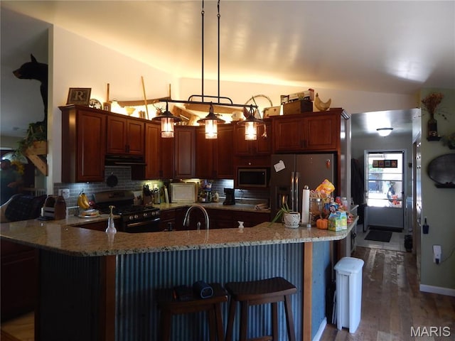 6230 Cuivre Ford Rd, Troy, MO 63379 - kitchen with appliances with stainless steel finishes, range hood, light stone counters, and backsplash