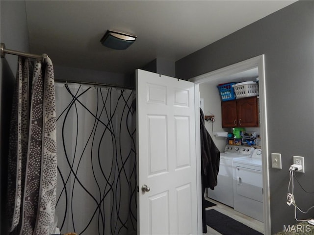 6230 Cuivre Ford Rd, Troy, MO 63379 - laundry room featuring washing machine and dryer and cabinet space