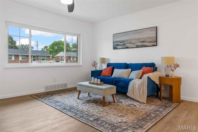 216 Clearpoint Ln, Saint Louis, MO 63123 - living room with wood finished floors, baseboards, and a ceiling fan