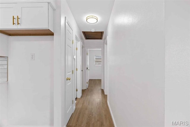 216 Clearpoint Ln, Saint Louis, MO 63123 - hall featuring baseboards and light wood finished floors