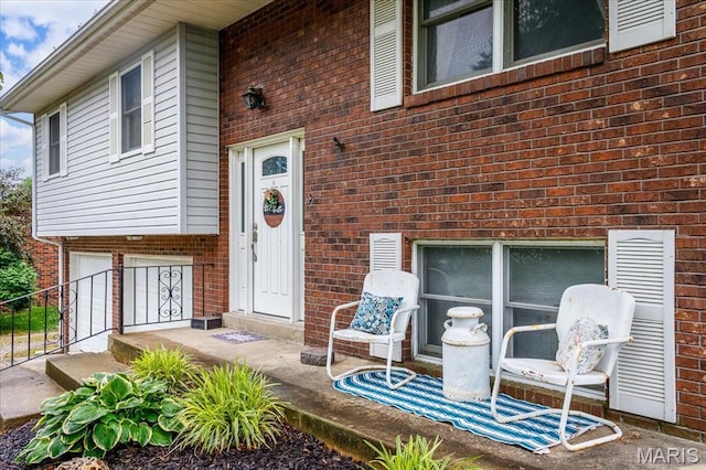 1170 Bond St, Carlyle, IL 62231 - view of exterior entry featuring brick siding
