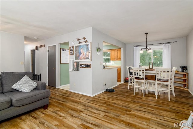 1170 Bond St, Carlyle, IL 62231 - living room featuring light wood-style floors and baseboards