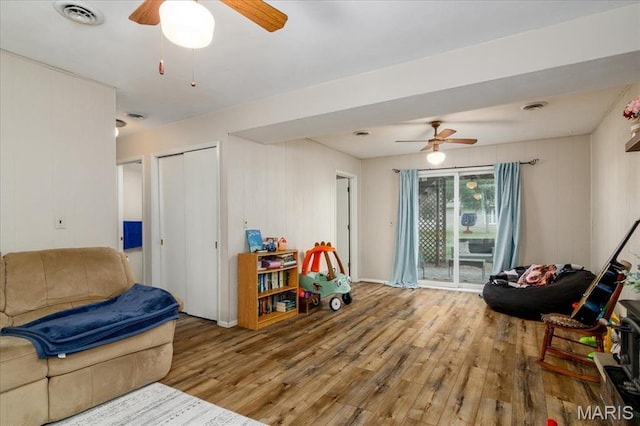 1170 Bond St, Carlyle, IL 62231 - living area featuring ceiling fan and wood finished floors