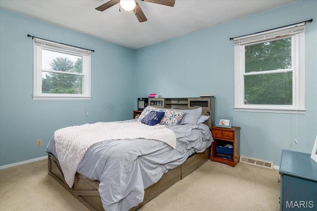 1170 Bond St, Carlyle, IL 62231 - carpeted bedroom featuring baseboards and a ceiling fan