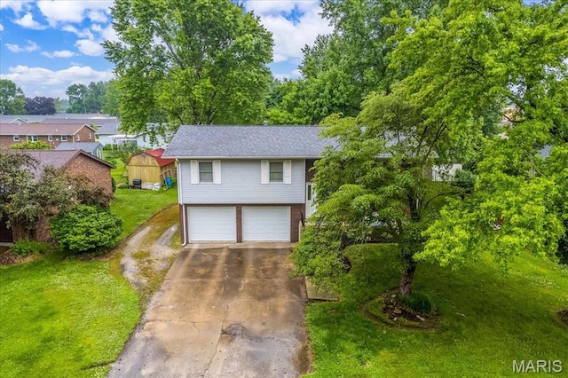 1170 Bond St, Carlyle, IL 62231 - garage featuring driveway