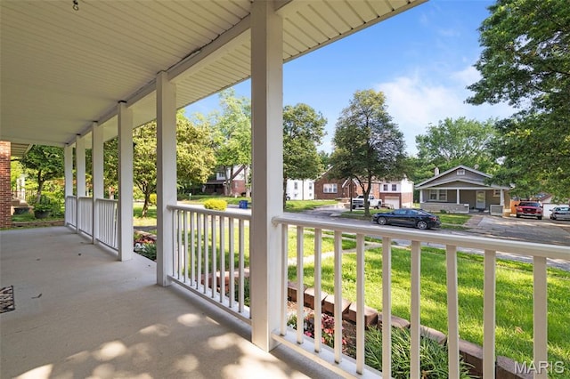 8217 Buchanan Ave, Saint Louis, MO 63114 - covered porch with a residential view